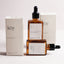 Organic anti-aging face serum with Bakuchiol, Rosehip, and Prickly Pear Seed Oil displayed on a minimalist skincare setup for hydration and wrinkle reduction